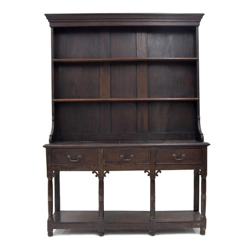 849 - 18th century oak dresser, the shelved raised back over a moulded top, above three short drawers rais... 