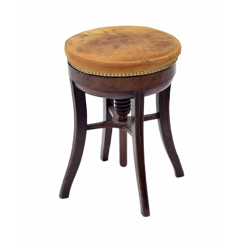 865 - Victorian mahogany piano stool, with a height adjusting suede leather seat with stud border, over fo... 