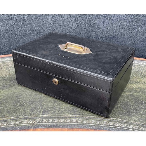 649 - Early 20th century leather bound travelling stationery case, the hinged cover with recessed brass ha... 