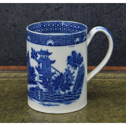 731 - 19th century pearlware blue and white porcelain tankard, decorated with a scene of figures in a fiel... 