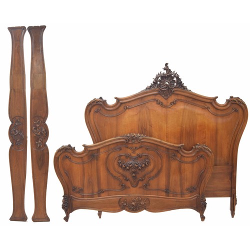 888 - Good French walnut carved bed frame, overall with carved scrolling foliate decoration, with side sup... 