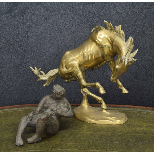 656 - Large decorative brass figure of a rearing horse, 18