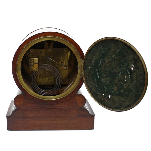 2304 - Mahogany two train drumhead mantel clock striking on a gong, within a stepped scrolling case, 11.5