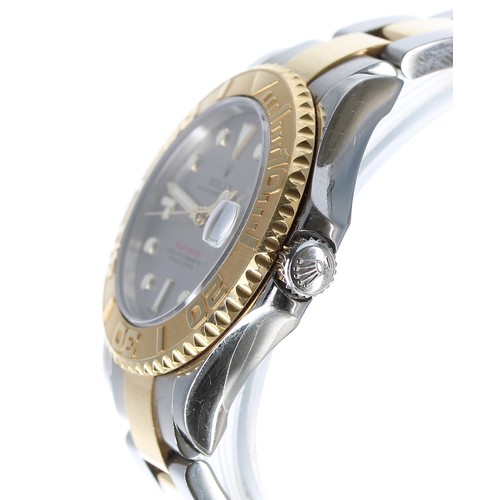 26 - Rolex Oyster Perpetual Date Yacht-Master Mid-Size gold and stainless steel wristwatch, reference no.... 