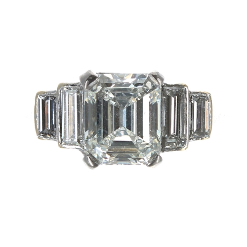 359 - Fine 18ct white gold emerald and baguette-cut ring in a stepped setting, the emerald-cut diamond 1.9... 