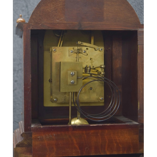 2337 - German mahogany ting-tang mantel clock and associated wall bracket, the W & H movement striking ... 