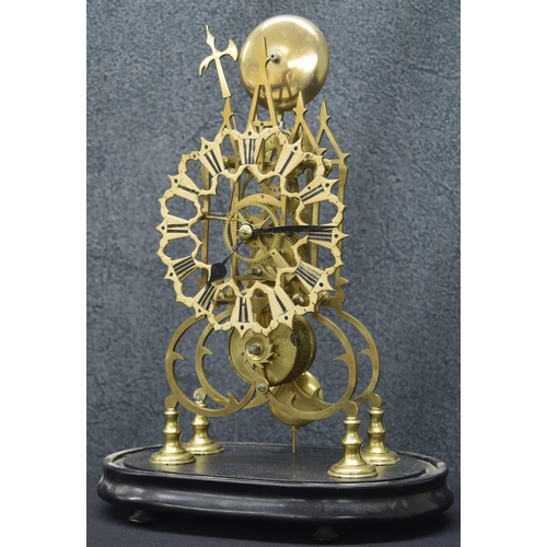 2343 - Brass single fusee skeleton clock with passing strike on a bell, the 6