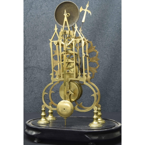 2343 - Brass single fusee skeleton clock with passing strike on a bell, the 6