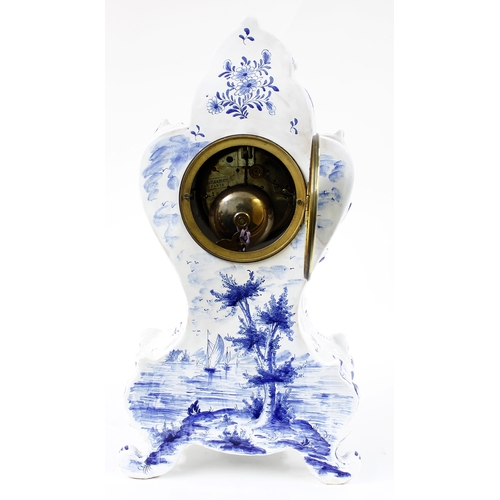 1517 - Dutch blue and white pottery balloon shaped two train mantel clock, the S. Marti movement striking o... 