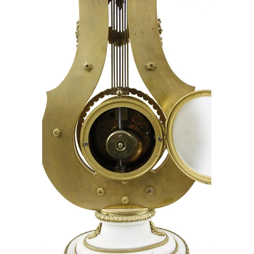 1523 - French marble and ormolu mounted two train lyre mantel clock, the S. Marti movement striking on a be... 