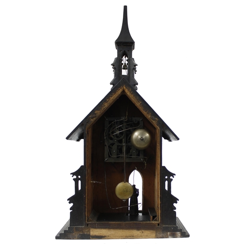 1535 - Rare Black Forest automaton two train novelty mantel clock modelled as a church with bell tower, the... 