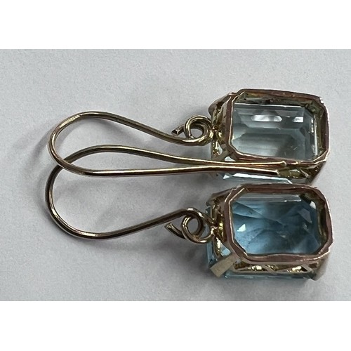 202 - Pair of aquamarine emerald-cut drop earrings set in yellow gold, each 4.60ct approx, 4.5gm, hook bac... 