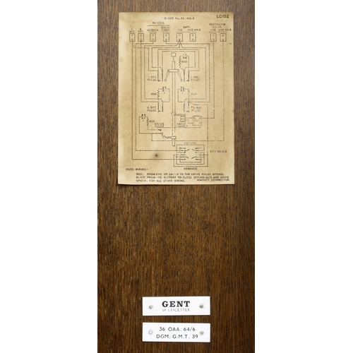 1120 - Gent electric master wall clock, within a dark stained oak glazed case, 55.25