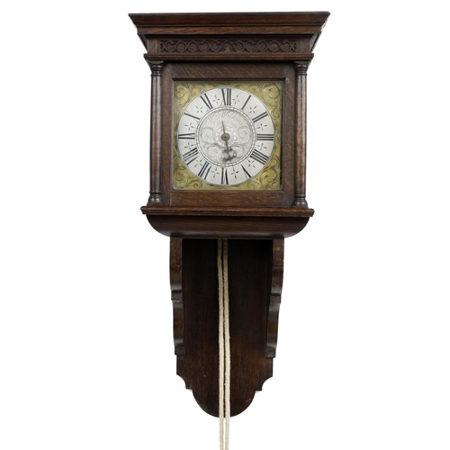 1715 - Oak hooded single train wall clock with alarm, the 7.25