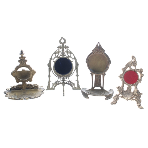 627 - Four gilt metal pocket watch stands, the tallest 6.75'' high approx (4)