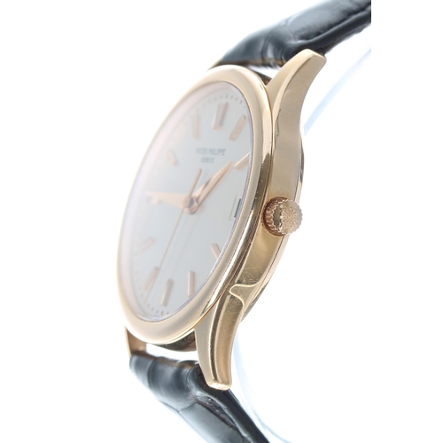 63 - Patek Philippe Calatrava 18ct rose gold automatic calendar gentleman's wristwatch, reference no. 399... 