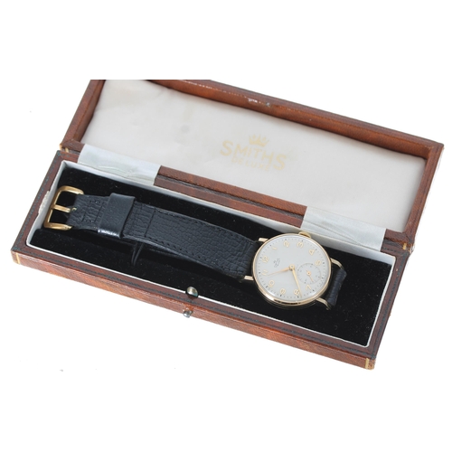 118 - Smiths Deluxe 9ct gentleman's wristwatch, Birmingham 1954, circular silvered dial with gilt applied ... 