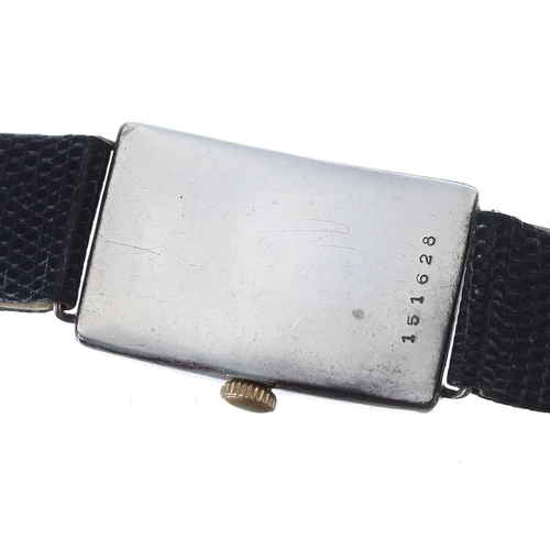 123 - Art Deco silver rectangular curved gentleman's wristwatch with wire-lugs, case no. 1516xx,  the dial... 