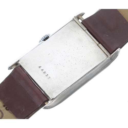 139 - Vintage white metal rectangular digital gentleman's wristwatch, hour and minute and seconds aperture... 