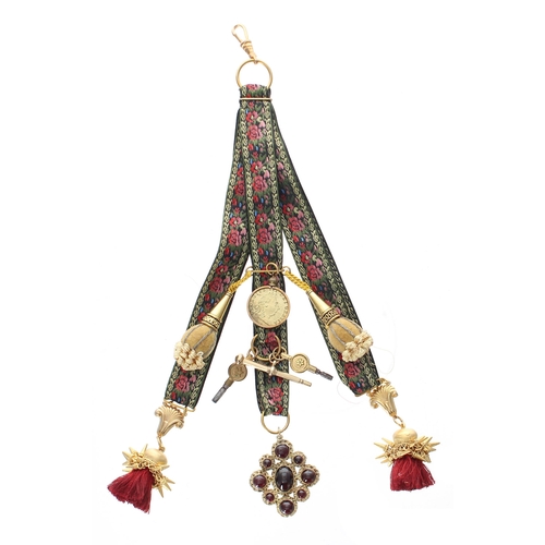 405 - Attractive floral four strand embroidered ribbon chatelaine, with four gilded fobs, cabouchon garnet... 