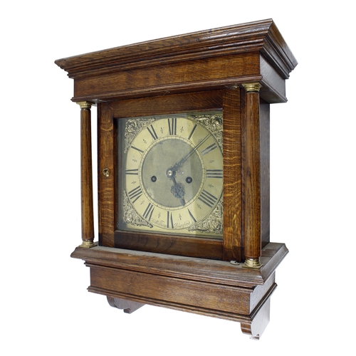 2635 - Oak two train hooded wall clock, the 10