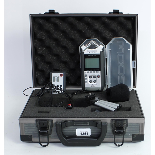 1377 - Zoom H4N Handy Recorder, with protective plastic case, fitted within a flight case enclosing a Zoom ... 