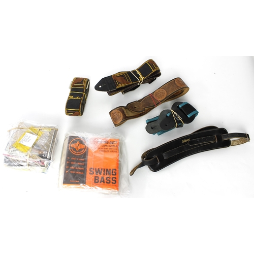 1104 - Five guitar straps to include an original 60s Selmer strap, two old Fender guitar straps and two oth... 