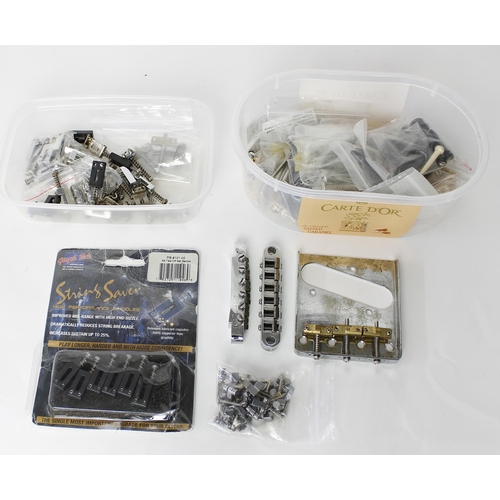 1112 - Good selection of guitar bridge fittings to include a Telecaster bridge plate with compensated brass... 