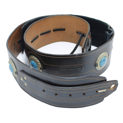 643 - Michael Chapman - a distinctive broad leather guitar strap, inlaid with turquoise medallions*Handmad... 