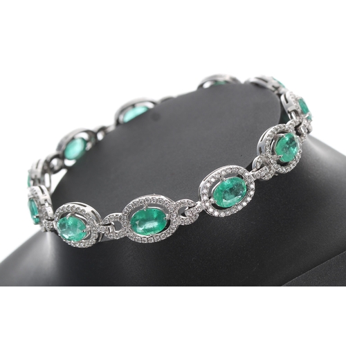 120 - Modern attractive 18ct white gold emerald and diamond line bracelet, oval emeralds 7.12ct total, dia... 