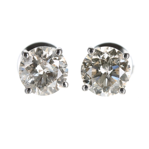 140 - Certificated pair of 18ct white gold round brilliant-cut diamond solitaire stud earrings, diamonds 2... 