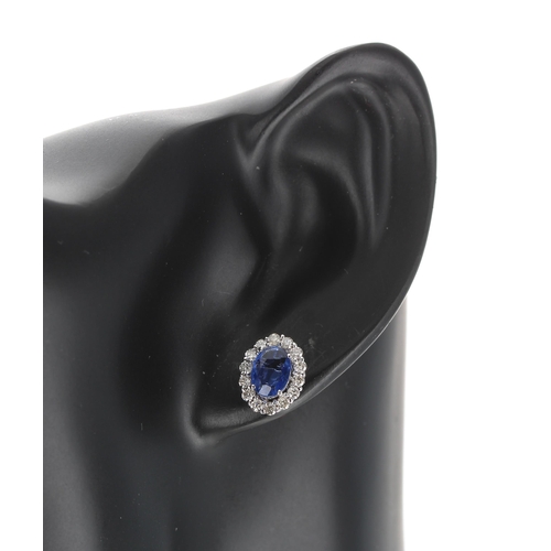 180 - Attractive pair of modern 18ct white gold oval sapphire and round brilliant cut diamond cluster stud... 