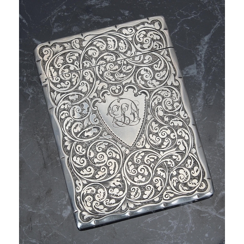 514 - Victorian silver card case, with foliate scrolling engraved decoration around a shield monogrammed c... 