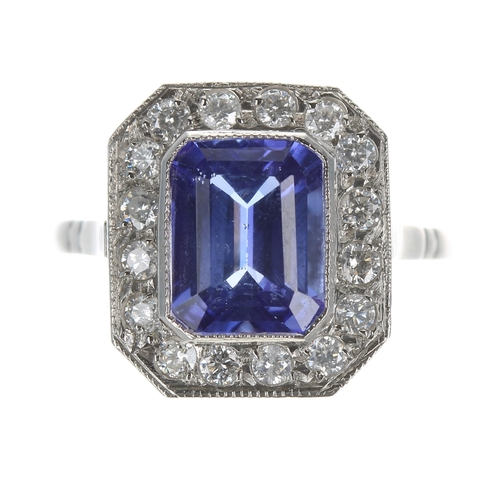 155 - Attractive tanzanite and diamond platinum octagonal cluster ring, the tanzanite 2.80ct approx, in a ... 