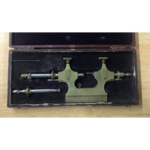 61 - Cased brass and steel Jacot tool