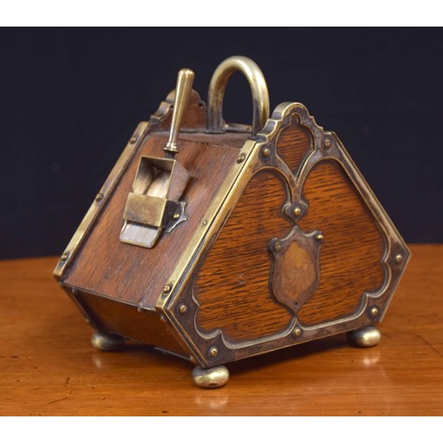 552 - Miniature novelty oak tea caddy, modelled as a coal scuttle with a silver plated handle, mounts, lin... 