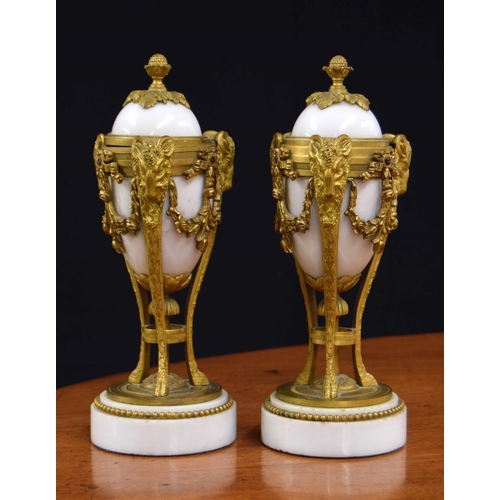 559 - Pair of Louis XVI style gilt mounted marble cassolette/candlesticks, the combination tops alternatin... 