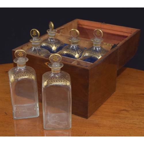 565 - 19th century mahogany decanter box with six French glass decanters, with gilt detail decoration, 11