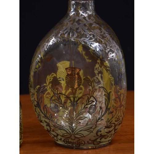 587 - Haig's dimple whisky decanter with a silvered overlay foliate scrolling decoration around thistles a... 