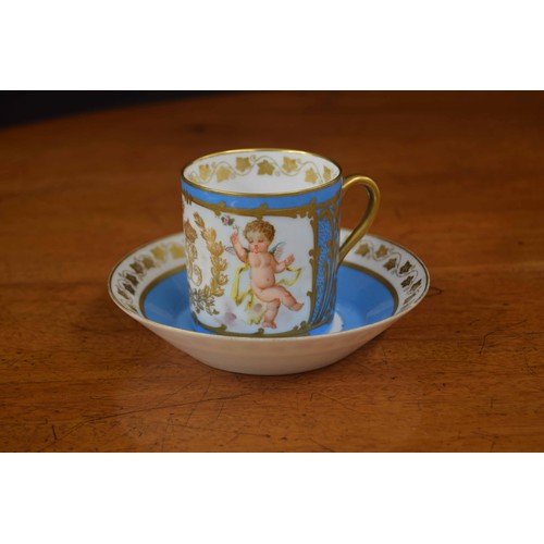 612 - 19th century Sevres 'Bleu Celeste' coffee can and saucer, decorated with winged cherubs around the g... 