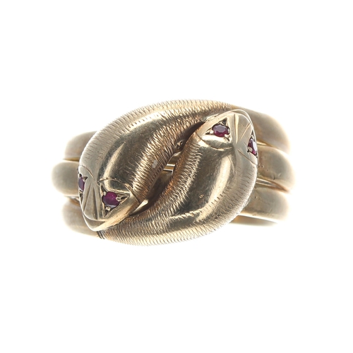 131 - 9ct yellow gold serpent snake design band ring, modelled with two heads with gem set eyes, width 13m... 