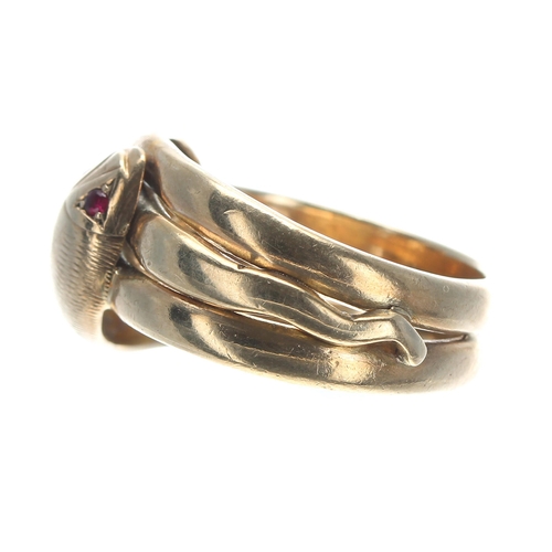 131 - 9ct yellow gold serpent snake design band ring, modelled with two heads with gem set eyes, width 13m... 