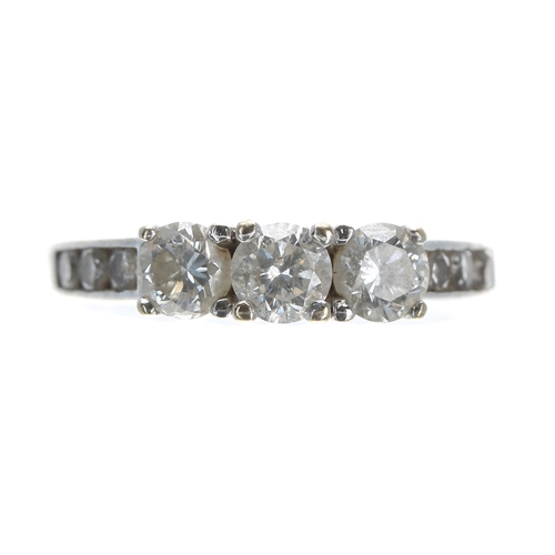 138 - Modern 18ct white gold diamond three stone ring with set shoulders, 0.85ct approx, width 4mm, 3.7gm,... 