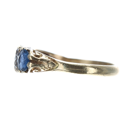 194 - 18ct yellow gold scroll set sapphire and diamond ring, with three sapphires and four old-cut diamond... 