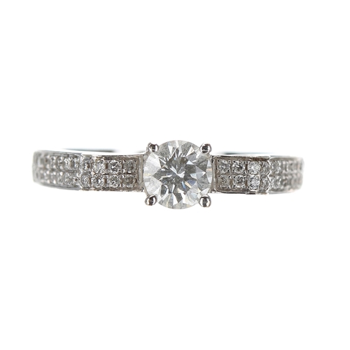 196 - Attractive modern 18ct white gold diamond ring, the round brilliant-cut centre diamond 0.38ct, width... 