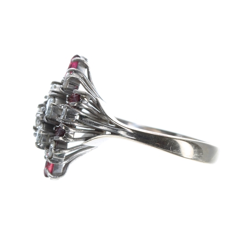 109 - 18ct white gold ruby and diamond cluster ring, with ten round brilliant-cut diamonds, 0.80ct approx ... 