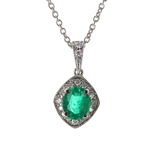 236 - Attractive 18ct white gold emerald and diamond cluster pendant on a slender chain, the oval emerald ... 