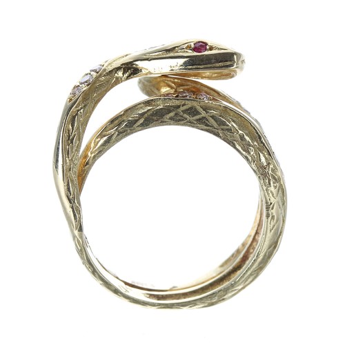 255 - Unusual 18ct yellow gold snake design ring, with ruby set eyes and diamonds to the head and body, 6.... 