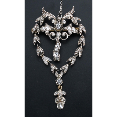 124 - Attractive antique diamond drop pendant with a brooch fitting & safety chain, set with old-cut d... 