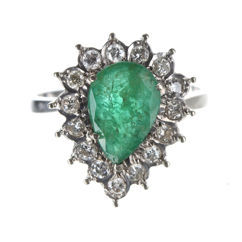 126 - Pear shaped emerald and diamond cluster white metal cluster ring, the emerald 1.40ct approx in a set... 